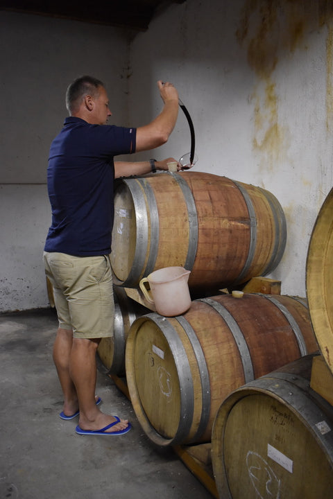 Hugo Truter with barrels of wine for The Wine Gallery - Wine at Home